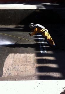 worker cleaning surface